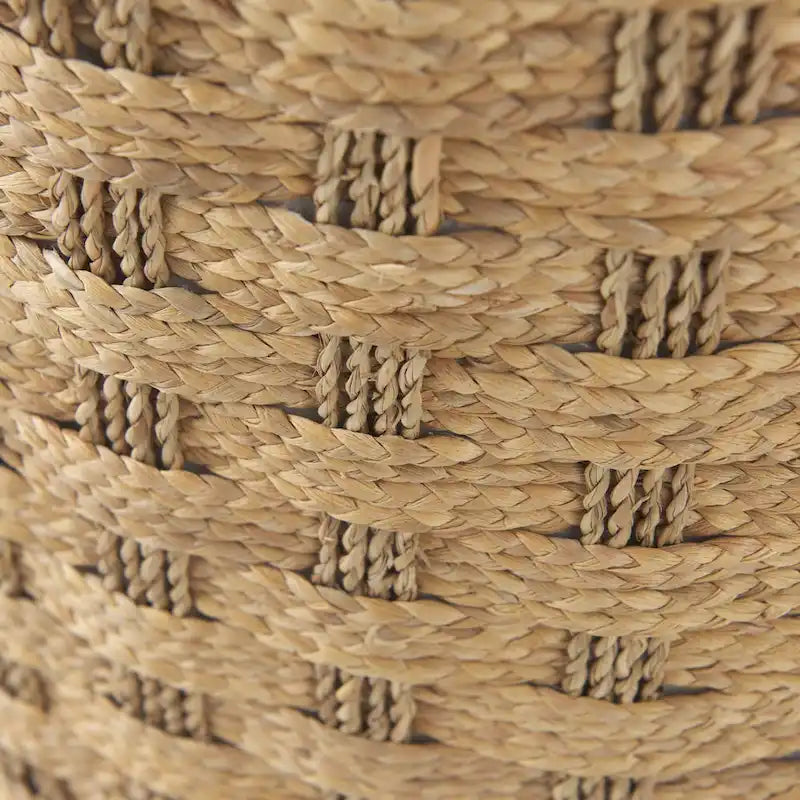Pouf rond tressé en jonc de mer à motifs marron, pièce unique