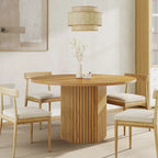 Table à manger ronde marron avec pied central pour 4 personnes