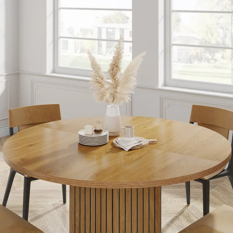 Table à manger ronde marron avec pied central pour 4 personnes